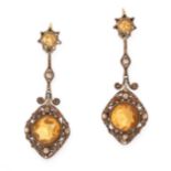A PAIR OF ANTIQUE CITRINE EARRINGS each set with two graduated round cut citrines accented by