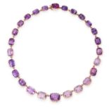 AN ANTIQUE AMETHYST RIVIERE NECKLACE, 19TH CENTURY in yellow gold, comprising a single row of