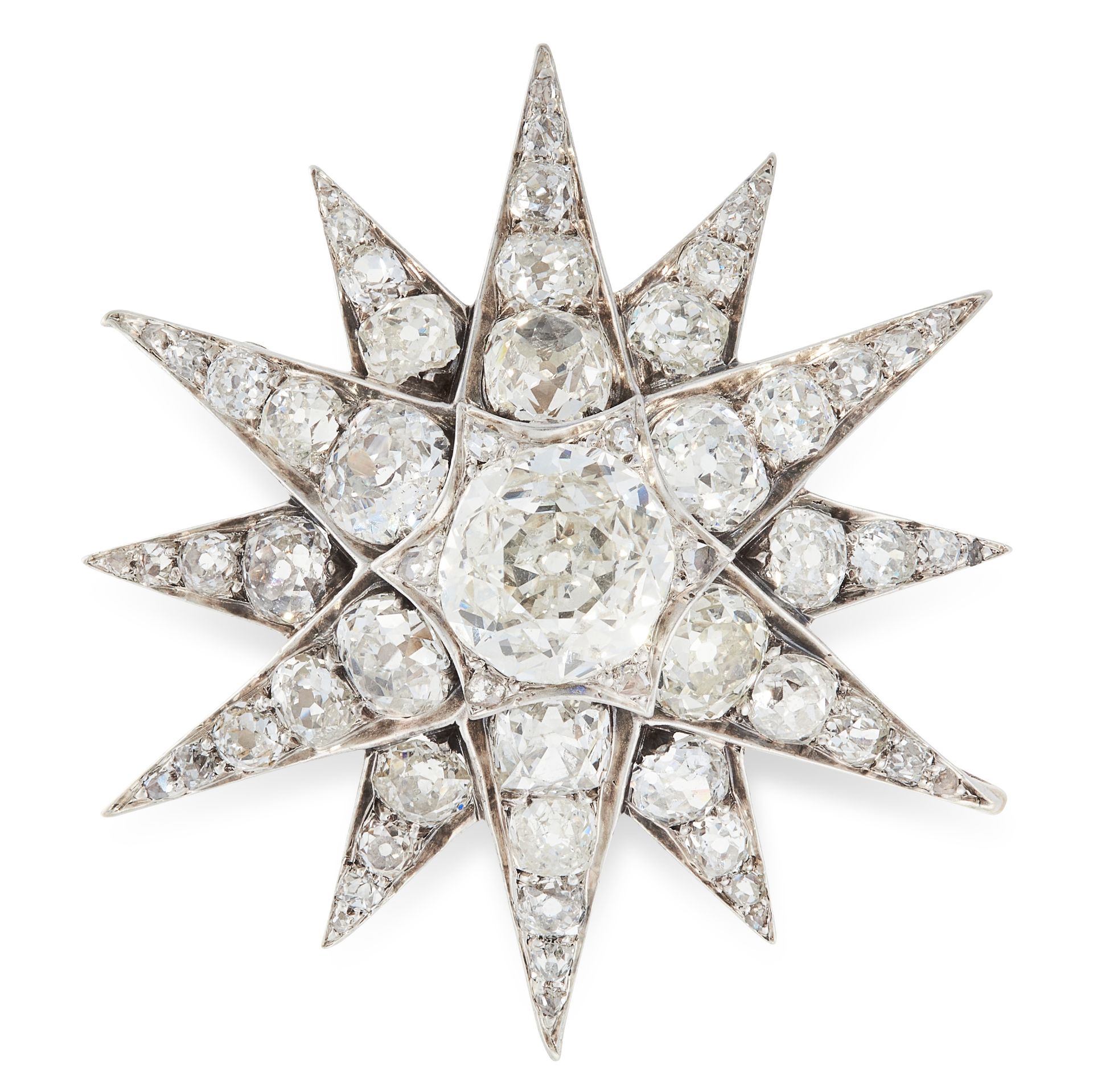 AN ANTIQUE DIAMOND STAR BROOCH / PENDANT, 19TH CENTURY in yellow gold and silver, designed as a
