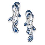 A PAIR OF SAPPHIRE AND DIAMOND PENDANT EARRINGS in 18ct white gold, each formed of undulating