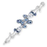 A SAPPHIRE AND DIAMOND BRACELET in 18ct white gold, the body designed as a series of undulating
