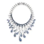 AN EXCEPTIONAL SAPPHIRE AND DIAMOND NECKLACE in 18ct white gold, designed as a fringe of articulated