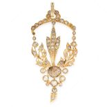 AN ANTIQUE DIAMOND PENDANT in yellow gold, the foliate designed body set with a principal rose cut