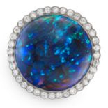 A BLACK OPAL AND DIAMOND RING in platinum, set with a central round cut black opal of 23.38