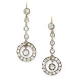 A PAIR OF ANTIQUE DIAMOND DROP EARRINGS in yellow gold and silver, each set with an old cut