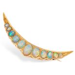 AN ANTIQUE OPAL CRESCENT BROOCH, 19TH CENTURY in yellow gold, designed as a crescent moon,