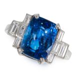 AN UNHEATED SAPPHIRE AND DIAMOND RING in platinum, set with a mixed cushion cut sapphire of 8.33