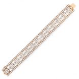 A DIAMOND BRACELET, VAN CLEEF & ARPELS in 18ct yellow gold, designed as a row of snowflake or flower