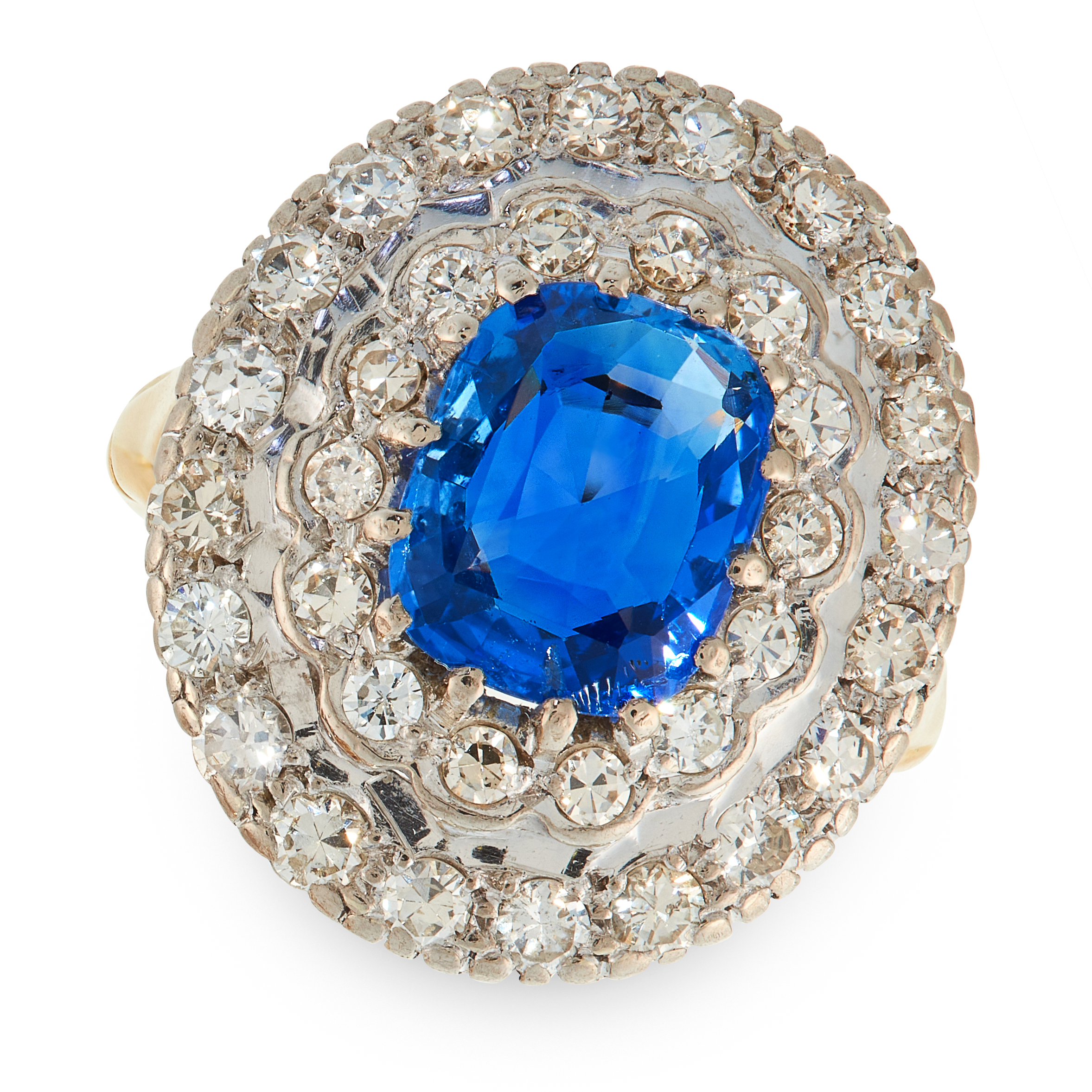 A CEYLON NO HEAT SAPPHIRE AND DIAMOND RING set with a central cushion cut blue sapphire of 2.51