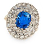 A CEYLON NO HEAT SAPPHIRE AND DIAMOND RING set with a central cushion cut blue sapphire of 2.51