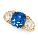 A CEYLON NO HEAT SAPPHIRE AND DIAMOND RING in 18ct yellow gold, set with a cushion cut blue sapphire