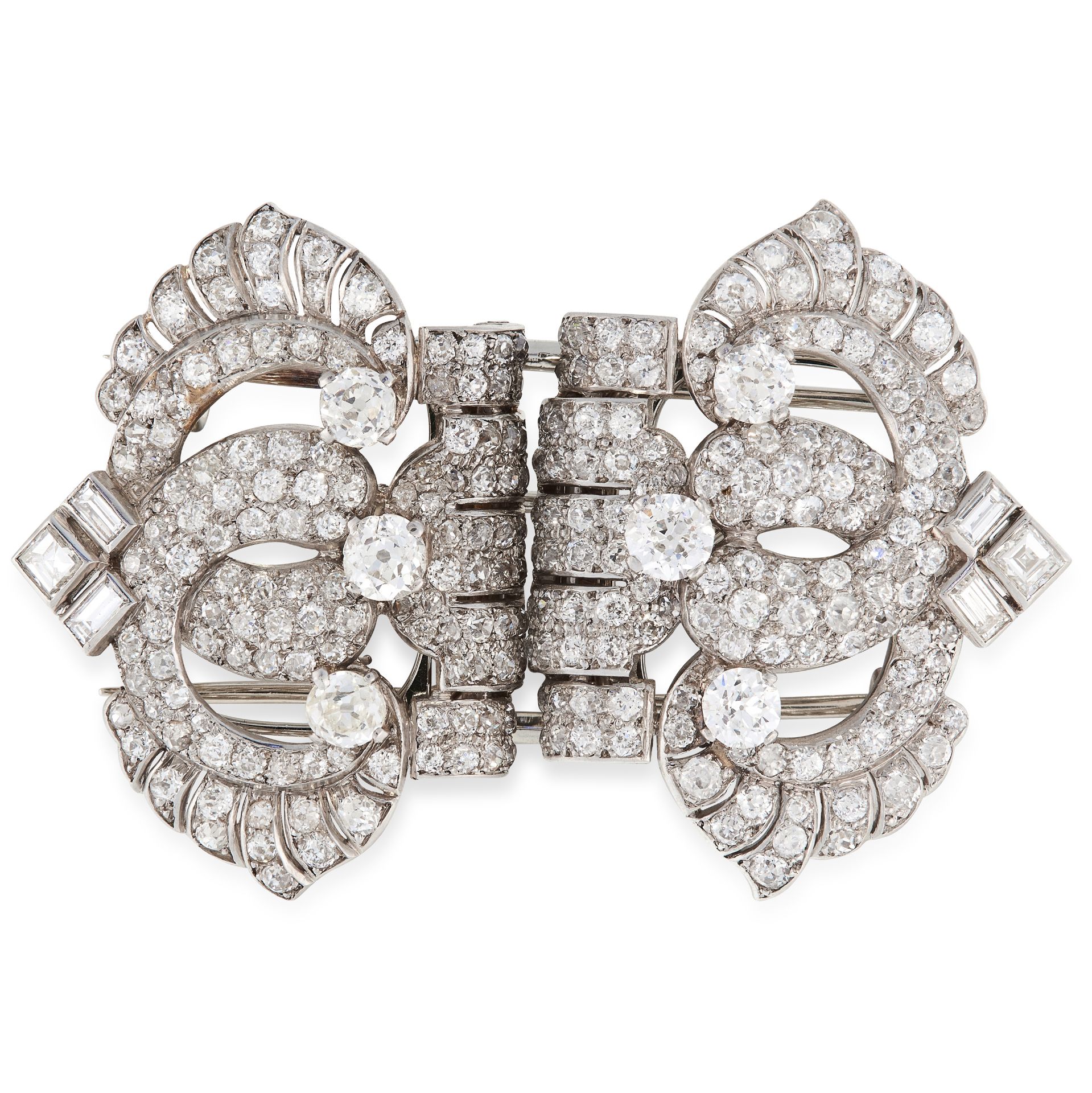 A VINTAGE DIAMOND DOUBLE CLIP BROOCH, CARTIER in white gold or platinum, in open framework design,