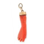 AN ANTIQUE CORAL HAND CORNICELLO PENDANT comprising of a carved coral hand, unmarked, 3.7cm, 2g.