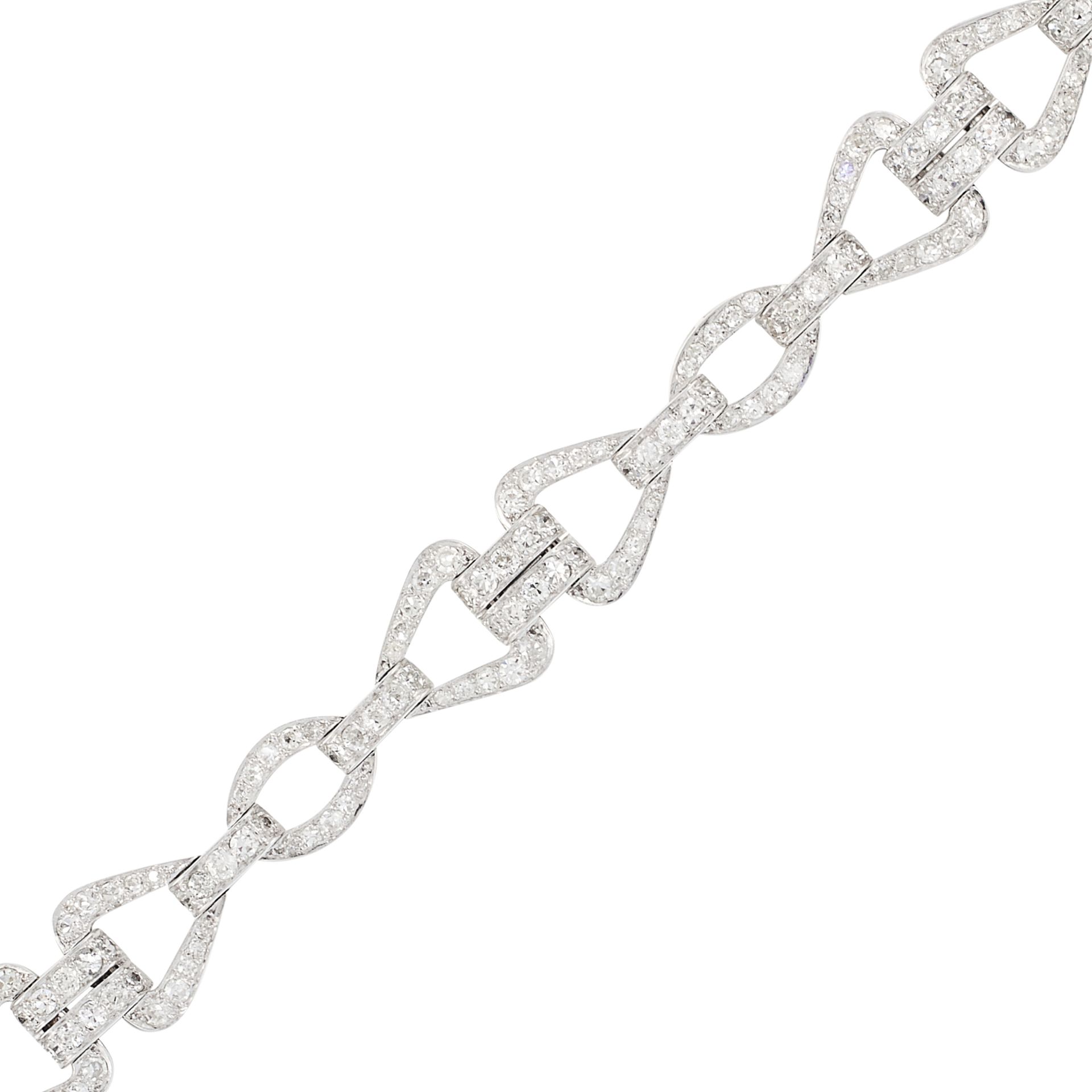 A VINTAGE DIAMOND BRACELET in platinum, comprising of alternating triangular and oval fancy links, - Image 2 of 2