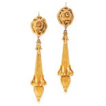 A PAIR OF ANTIQUE RUBY DROP EARRINGS, 19TH CENTURY in yellow gold, comprising of a foliate drop