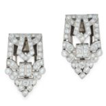 A PAIR OF ART DECO DIAMOND CLIP BROOCHES in platinum, of shield design, set with round and single