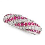 A RUBY AND DIAMOND BOMBE RING in 18ct white gold, set with alternating rows of round cut diamonds