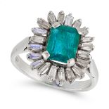 AN EMERALD AND DIAMOND CLUSTER RING set with an emerald cut emerald in a border of baguette cut
