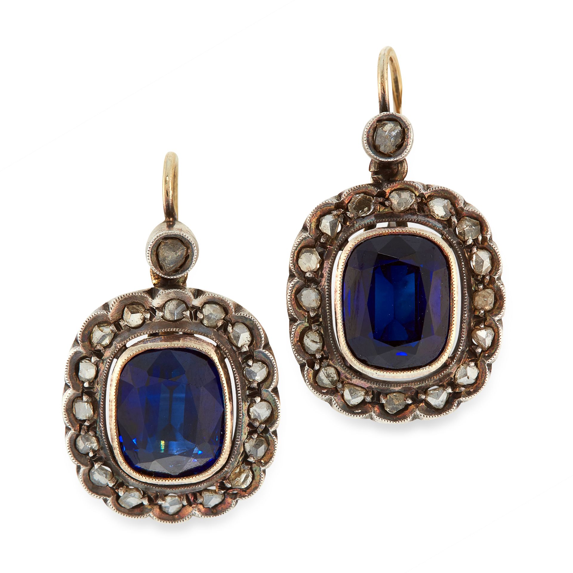 A PAIR OF SYNTHETIC SAPPHIRE AND DIAMOND CLUSTER EARRINGS in yellow gold and silver, each comprising