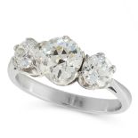 A DIAMOND THREE STONE RING in platinum, set with a principal old cut diamond of 1.16 carats