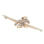 AN ANTIQUE DIAMOND AND RUBY BIRD BAR BROOCH in yellow gold, the body of the bird is set with rose