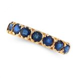 A SAPPHIRE SEVEN STONE RING in yellow gold, set with seven round cut sapphires totalling 1.30