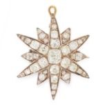 AN ANTIQUE DIAMOND STAR PENDANT / BROOCH, 19TH CENTURY in yellow gold and silver, designed as a