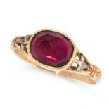 AN ANTIQUE GARNET DRESS RING, EARLY 19TH CENTURY in yellow gold and silver, set with an oval cut