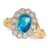 AN AQUAMARINE AND DIAMOND CLUSTER RING in 18ct yellow gold, set with an oval cut aquamarine of 1.