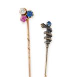 TWO ANTIQUE TIE / STICK PINS in yellow gold and silver, one set with a round cut ruby, diamond and