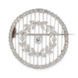 AN ANTIQUE DIAMOND BROOCH, EARLY 20TH CENTURY of circular design, set with a central old cut diamond