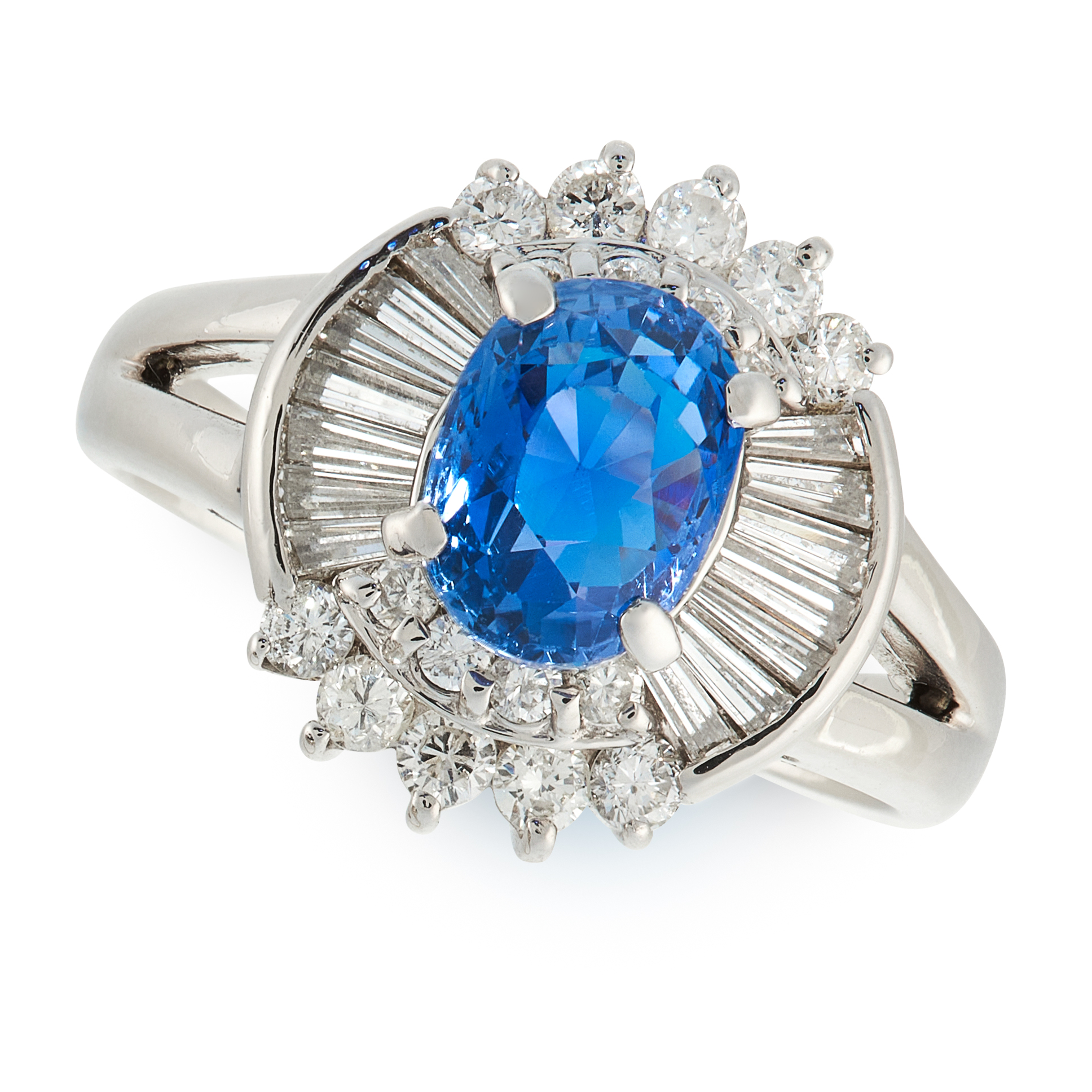 A SAPPHIRE AND DIAMOND CLUSTER RING in platinum, set with an oval cut sapphire of 1.93 carats in a