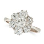 A DIAMOND CLUSTER RING in 18ct white gold, set with a cluster of old cut diamonds totalling 1.2-1.