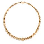 A FANCY LINK BEAD NECKLACE comprising of a single row of graduated textured gold beads, unmarked,