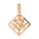 AN ANTIQUE MASONIC PENDANT in yellow gold, depicting various tools including axe, compass, etc,