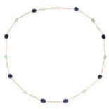 A SAPPHIRE AND TOPAZ NECKLACE in 14ct yellow gold, the chain is set with eight cabochon sapphires