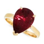 A PINK TOURMALINE DRESS RING in 18ct yellow gold, set with a pear cut pink tourmaline of 5.20