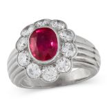 A BURMA NO HEAT RUBY AND DIAMOND RING, CARTIER set with an oval cut ruby of 2.30 carats within a