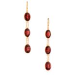A PAIR OF GARNET EARRINGS in yellow gold, each comprising of three oval cut garnets connected by