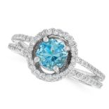 AN AQUAMARINE AND DIAMOND DRESS RING in 18ct white gold, set with a fancy octagonal brilliant cut