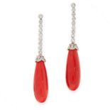 A PAIR OF CORAL AND DIAMOND EARRINGS each set with a row of nine round cut diamonds, suspending a