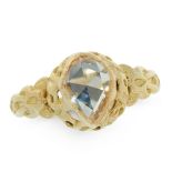 AN ANTIQUE SOLITAIRE DIAMOND DRESS RING in yellow gold, set with a pear shaped rose cut diamond of