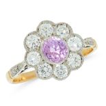 A PINK SAPPHIRE AND DIAMOND CLUSTER RING in 18ct yellow gold, set with a round cut pink sapphire