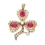 AN ANTIQUE RUBY AND DIAMOND CLOVER PENDANT / BROOCH, 19TH CENTURY in yellow gold and silver,