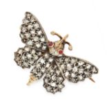 A RUBY AND DIAMOND BUTTERFLY BROOCH in yellow gold and silver, designed as a butterfly set allover