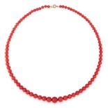 AN ANTIQUE CORAL BEAD NECKLACE in yellow gold, comprising a single row of eighty-three graduated