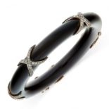 A DIAMOND AND WOOD BANGLE the body formed of a single piece of polished wood with black lacquer