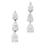 A PAIR OF DIAMOND DROP EARRINGS in platinum, each formed of three pear cut diamonds totalling 1.8-