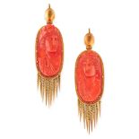 A PAIR OF ANTIQUE CORAL CAMEO TASSEL EARRINGS, 19TH CENTURY in yellow gold, each set with an oval