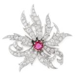A RUBY AND DIAMOND BROOCH designed as a stylised flower, set at the centre with a cushion cut ruby